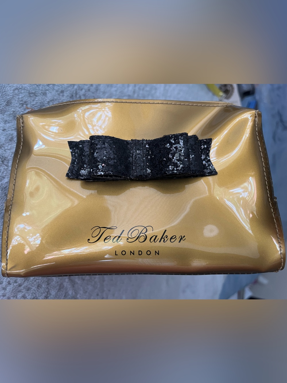 Ted Baker Gold Patent Cosmetic Pouch with Black Sequin Bow